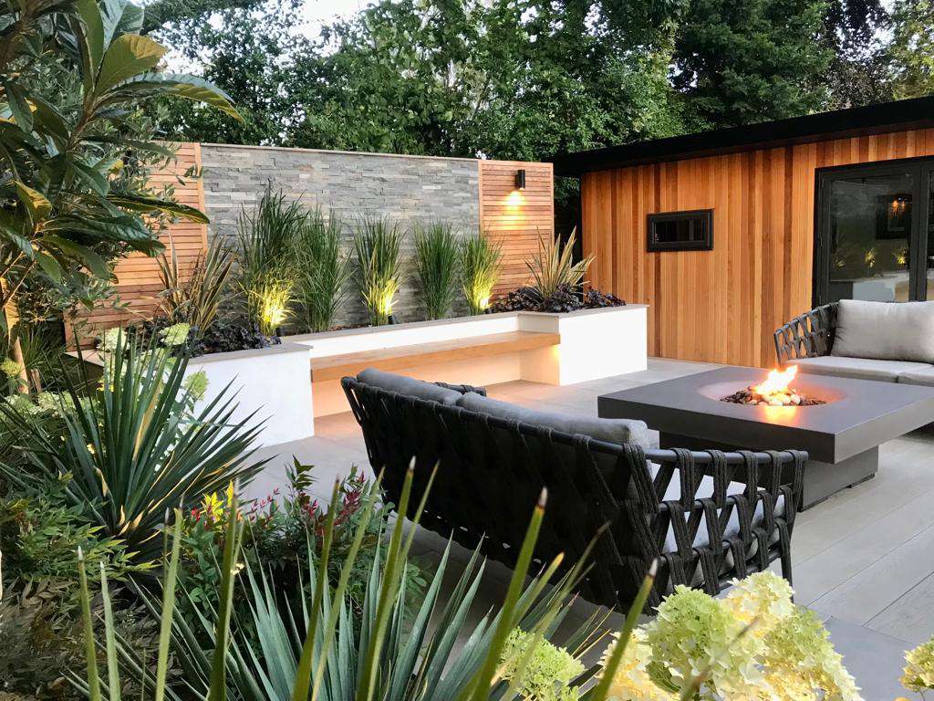 Outdoor living area with fire pit in Chiswick